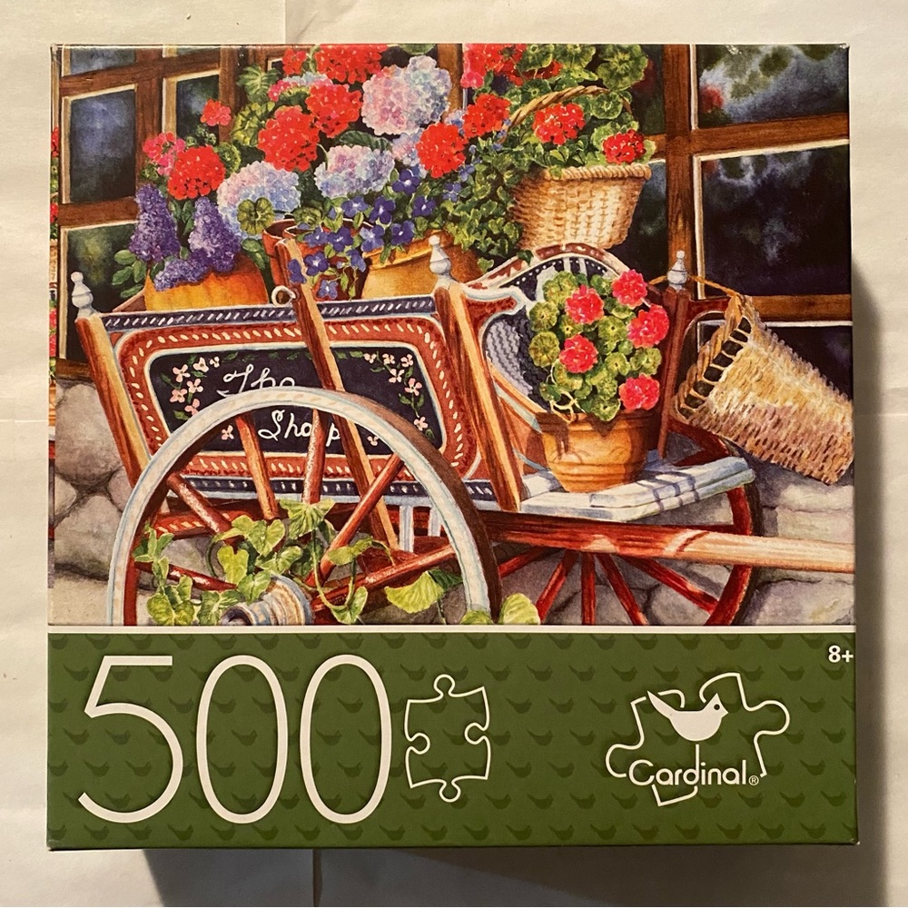 “Peddlin’ Posies” 500 Piece Puzzle by Cardinal Industries